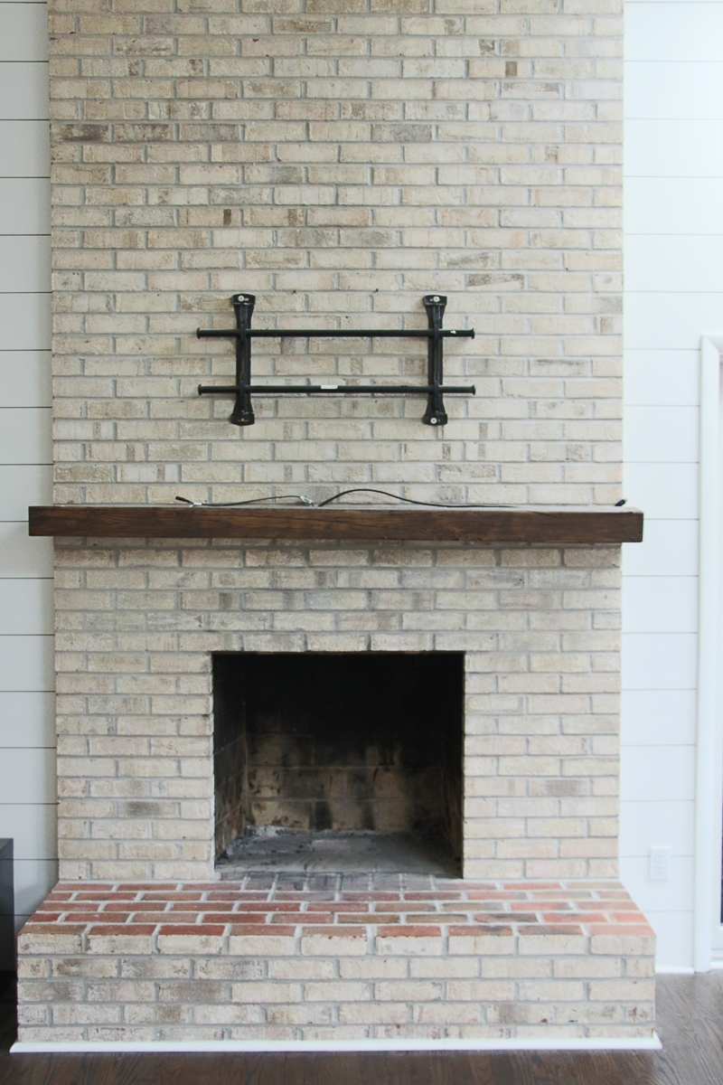 How To Whitewash Your Brick Fireplace With Milk Paint The Greenspring Home