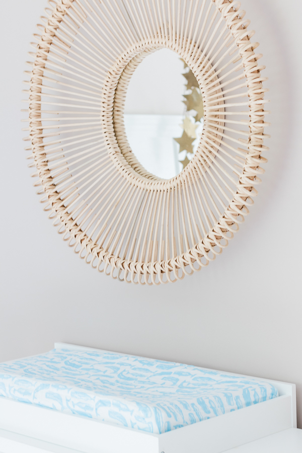 round nursery mirror and changing pad