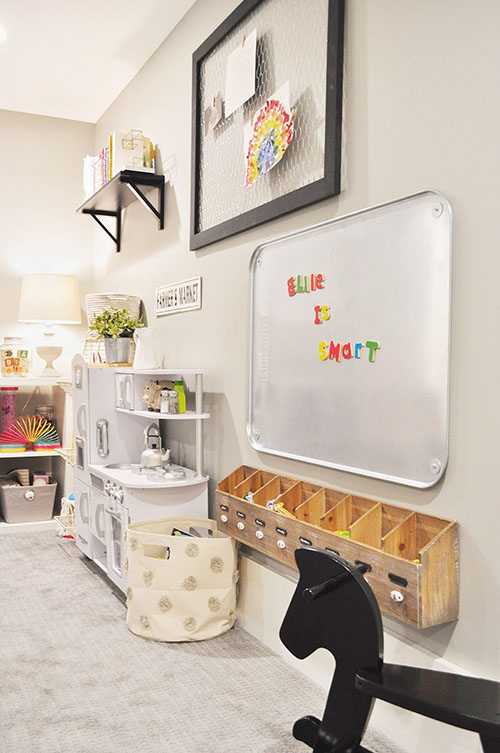 wood wall storage for small parts and pieces in kids playroom 