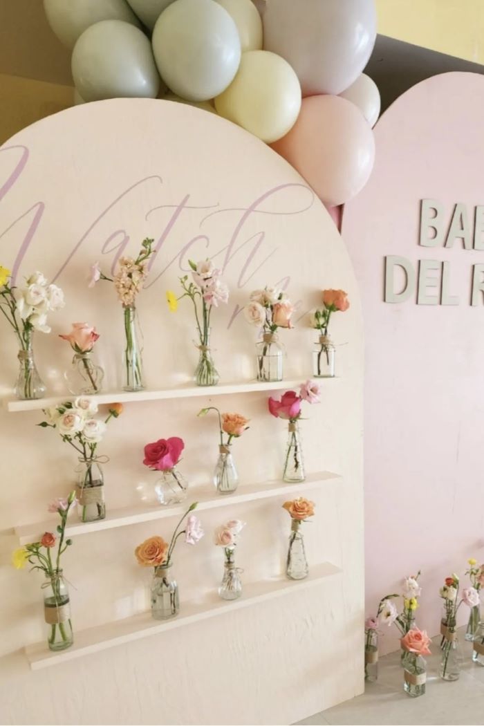 baby in bloom favor wall
